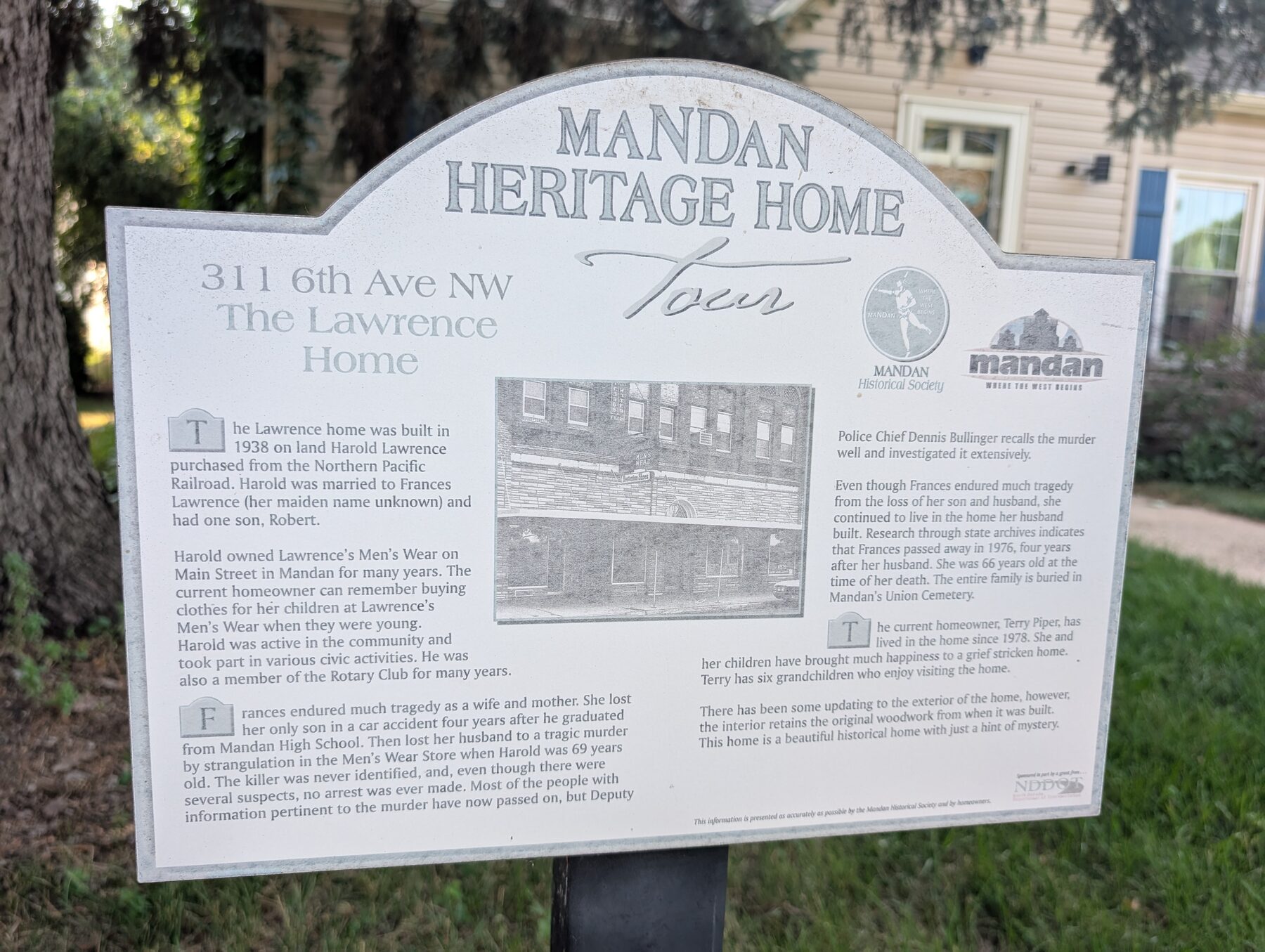 The Lawrence Home heritage sign